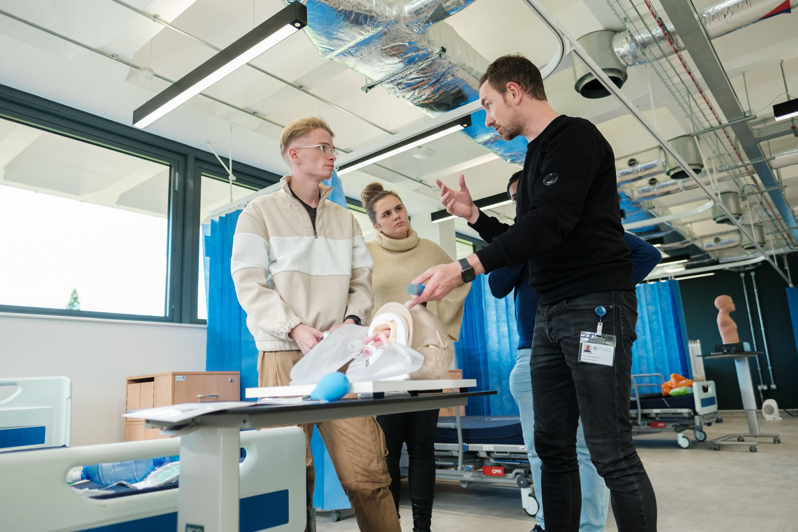 Student discussing the results after using a simulation dummy